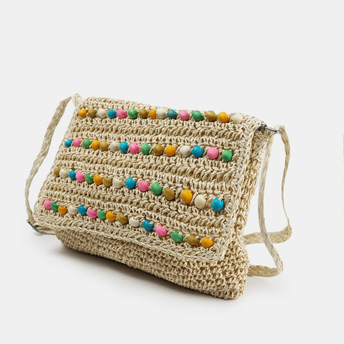 Bolso bandolera de rafia con bolitas para mujer beige Nadia