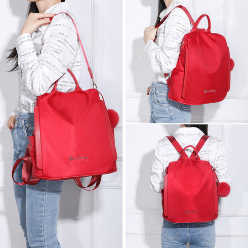 Mochila antirrobo Impermeable para mujer (14.80L) | Mochila Convertible en bolso con pompón y asa desmontable de adorno Rojo